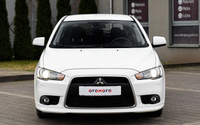 Mitsubishi Lancer cena 32900 przebieg: 150000, rok produkcji 2014 z Radom małe 596